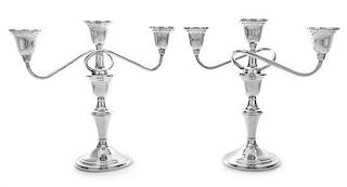 A Pair of American Silver Three-Light Candelabra, International Silver Company, Meriden, CT, having a central cup surmounting