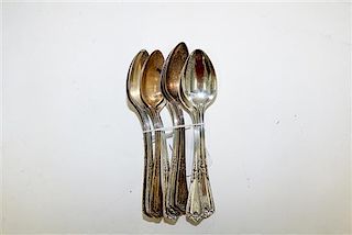 A Set of Nine American Silver Teaspoons, Reed & Barton, Taunton, MA, the handle decorated with floral and vine elements in th