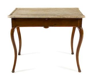 * A Louis XV Provincial Style Walnut Occasional Table Height 29 3/4 x width 37 1/4 x depth 26 1/2 inches.