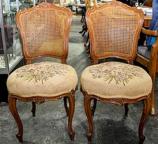 A Pair of Louis XV Style Chairs. Height of each 36 inches.