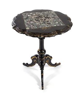 * A Victorian Mother-of-Pearl Inlaid Papier Mache Table Height 28 1/2 x diameter of top 24 inches.