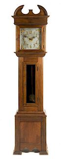 * An American Walnut Tall Case Clock Height 89 inches.