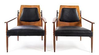 A Pair of American Mid-Century Elm and Leather Armchairs Height 31 1/2 inches.