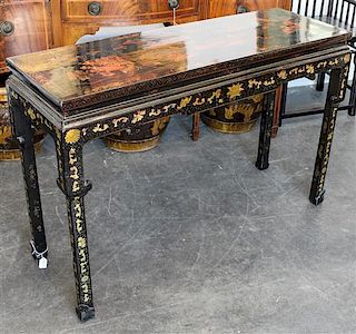 A Chinese Lacquered Altar Table Height 32 1/4 x width 49 x depth 16 1/2 inches.