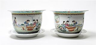 * A Pair of Chinese Famille Rose Porcelain Cache Pots and Underplates Height of cache pots 6 3/4 x diameter of plates 9 inche