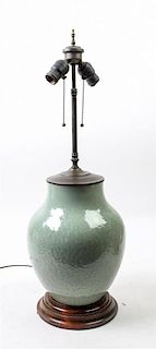 * A Chinese Celadon Glazed Porcelain Vase Height of vase 12 inches.