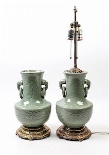 * A Pair of Chinese Green Glazed Porcelain Vases Height of vases 11 1/4 inches.