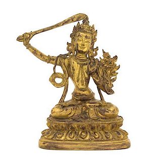 A Sino-Tibetan Gilt Bronze Figure of Manjushri Height 6 3/4 inches.