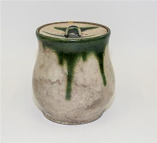 * A Japanese Stoneware Jar and Cover Height 7 1/2 inches.