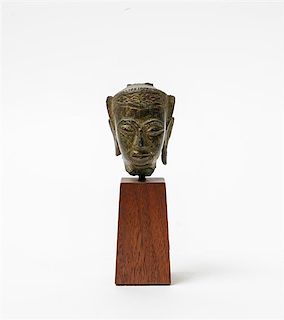 * A Thai Gilt Bronze Head of Buddha Height of bronze 2 1/2 inches.