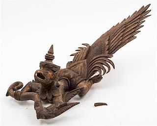 An Indonesian Carved Wood Garuda. Height 24 1/2 x width 10 inches.