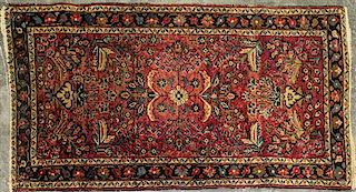 A Persian Wool Mat 4 feet 8 inches x 2 feet 7 inches.