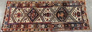 A Northwest Persian Wool Runner 9 feet 8 inches x 3 feet 6 inches.