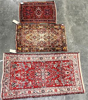 Three Persian Wool Rugs Largest 4 feet 3 inches x 2 feet 5 inches (of largest).