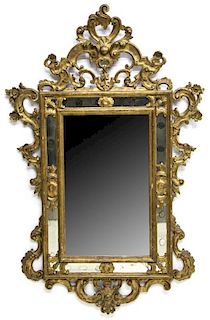 ITALIAN ROCAILLE CARVED GILTWOOD MIRROR, 19TH C.