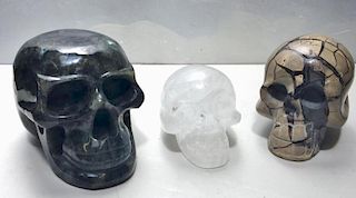 Set of 3 Carved Crystal and Stone Skulls.