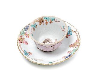 A Chinese Export Cup and Saucer, Diameter of saucer 4 1/4 inches.