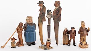 Group of German carved figures and accessories, ta