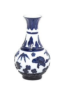 A Blue and White Peking Glass Baluster Vase, Height 9 1/2 inches.