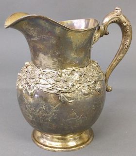 Silver water pitcher