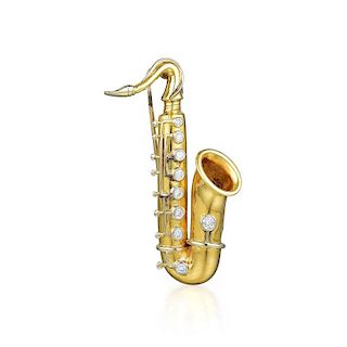 A Gold and Diamond Saxophone Brooch