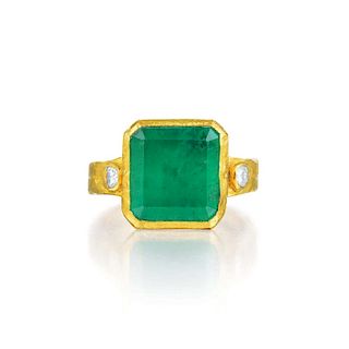 An Emerald and Diamond Ring
