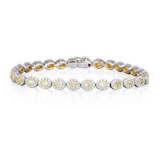 A White and Yellow Diamond Tennis Bracelet