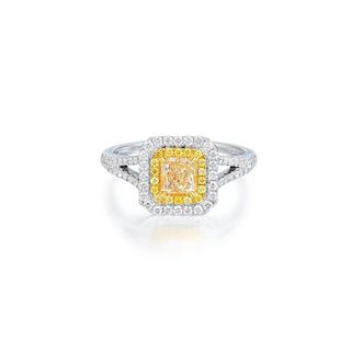 A Yellow and White Diamond Ring