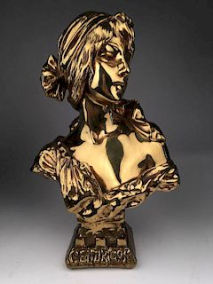 "Cendrillon" a gold painted bronze bust.