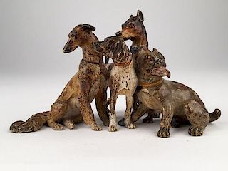 Antique Vienna cold painted bronze figure of four dogs.