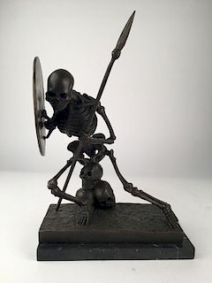 Bronze figure of a skeleton with a sword and schield