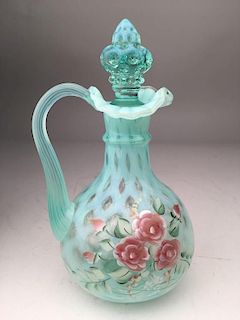 Vintage glass pitcher with stopper.