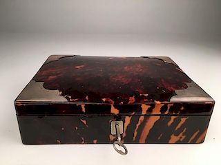 Antique  shell box with a hindged lid.