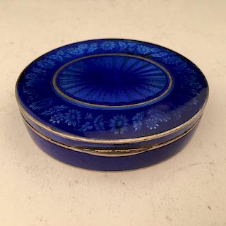 Silver and colbalt blue oval box.
