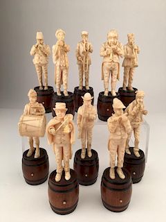 German carvings of a German marching band, each member with a musical instrument