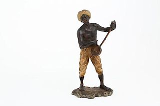 Bergman Vienna bronze figure of a man with mandolin.<BR>Marked with monogram.<BR>Hei