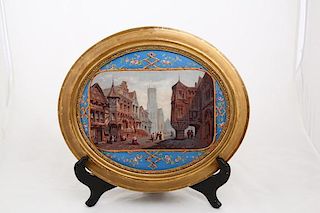 A pair of antique painted oval plaques, each of an old village.