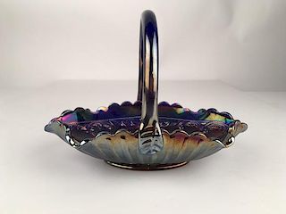 Vintage Fenton carnival glass basket with applied handle.