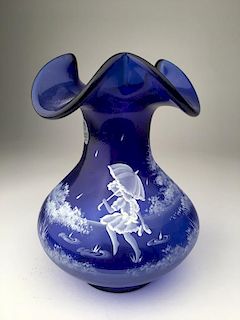 Vintage Fenton blue glass ruffled rim vase with a painted winter scene.<BR>Signed
