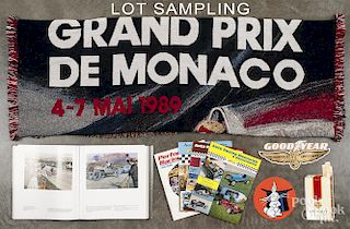 Collection of automobile and racing ephemera, to include pins, bumper stickers, patches, pennants, e