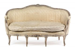 A Louis XV Style Silvered Wood Canape Height 40 x width 71 inches.