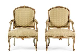 A Pair of Louis XV Style Painted and Parcel Gilt Fauteuils Height 38 1/4 inches.