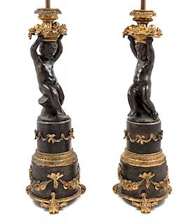 A Pair of Continental Gilt and Patinated Bronze Figural Table Lamps Height 31 inches.
