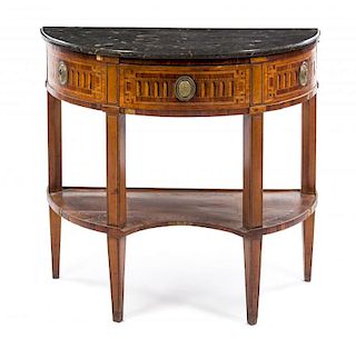 A Louis XVI Marquetry Console Desserte Height 34 x width 37 x depth 17 1/2 inches.