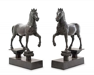 A Pair of Continental Bronze Models of Horses Height 12 3/4 inches.