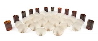 A Collection of Seashell and Tortoise Shell Sconce Shades Height of tallest tortoise shell sconce 4 1/4 inches.