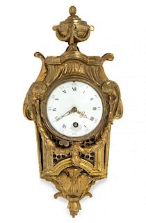 A Louis XVI Style Gilt Bronze Cartel Clock Height 17 3/4 inches.