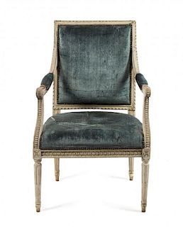 A Louis XVI Painted Fauteuil Height 35 inches.