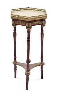 A Louis XVI Style Gilt Metal Mounted Mahogany Gueridon Height 29 5/8 inches.