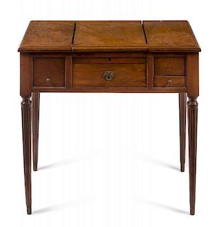 A Louis XVI Style Walnut Poudreuse Height 28 1/2 x width 31 x depth 18 inches.